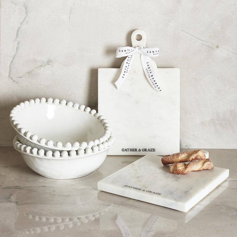 Marble cutting board with matching marble bowls, elegant home decor gift items.