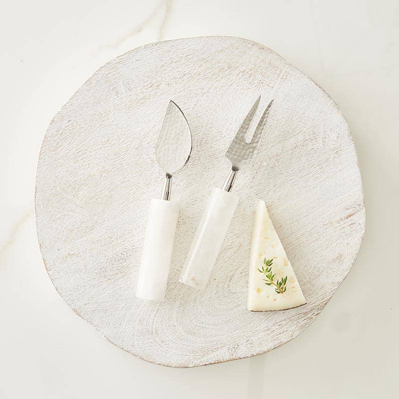 Alabaster Cheese Knives Set Displayed on a Cutting Board.