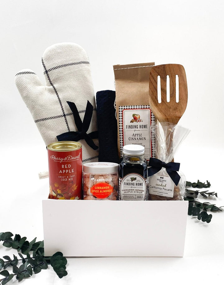 Autumn Harvest Breakfast Set gift box with apple cinnamon pancake mix, cinnamon maple syrup, cider mix, baking essentials, spiced almonds, and candied pecans.