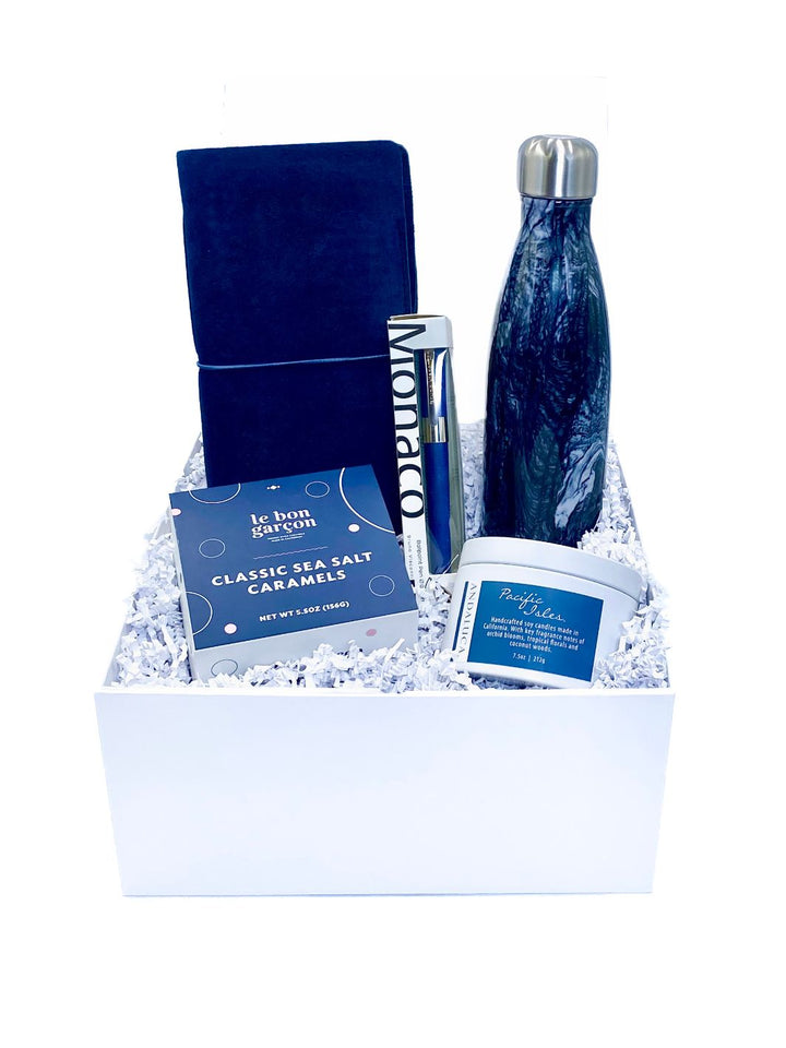 Azure Ocean Writer's Gift Box with journal, pen, water bottle, candle, and caramels.