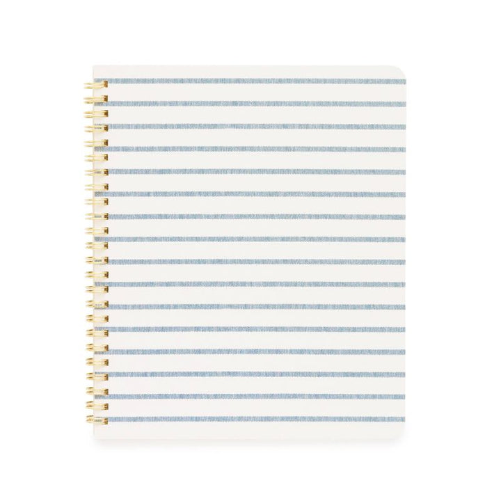 Stylish white notebook with blue Breton stripes and gold spiral binding, perfect for notes and creativity.