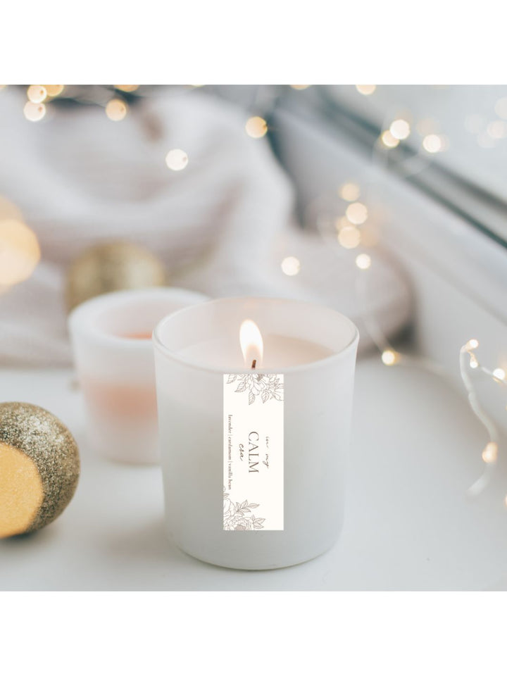 Calm Era Candle with lavender, cardamom, and vanilla bean scent.