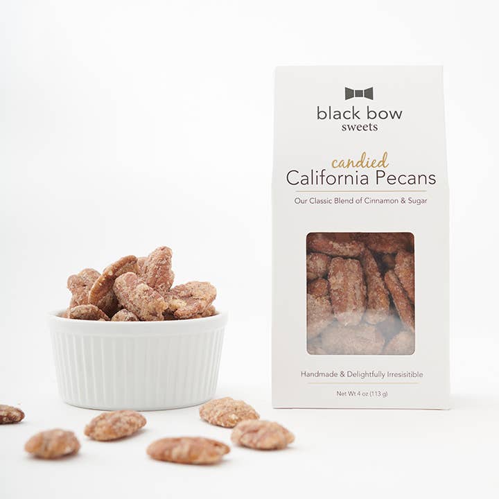 Box of Candied California Pecans handmade with a delicious blend of cinnamon and sugar. Shown inside package and in a bowl.