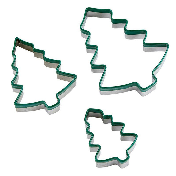 Set of three green Christmas tree cookie cutters made of silicone in small, medium and large sizes.