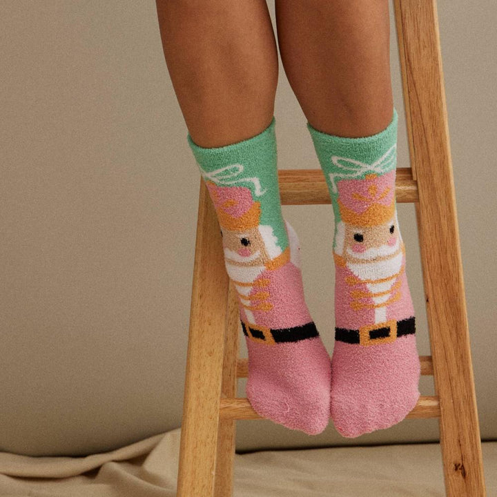 Close-up of Nutcracker Socks on Model. 