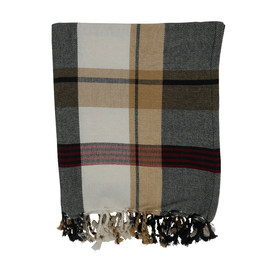 Cozy plaid throw blanket in a soft cotton material, perfect for indoor or outdoor use, offering warmth and comfort.