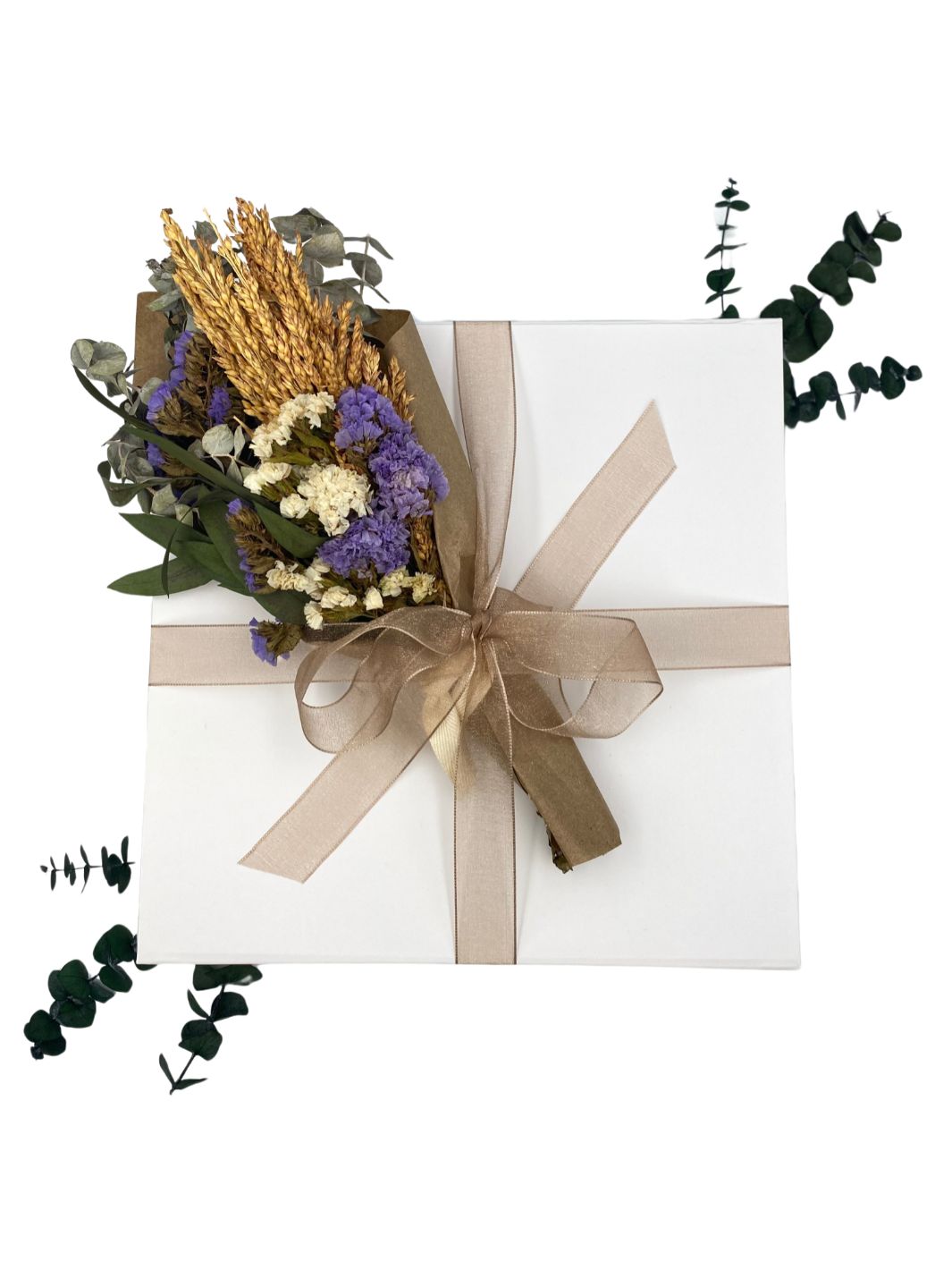 Forget You Not Gift Box ready-to-ship; adorned with purple floral eucalyptus bouquet and chiffon ribbon. 