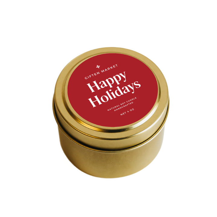 Festive 4 oz soy candle in gold tin, states "Happy Holidays", perfect for gifting and holiday ambiance.