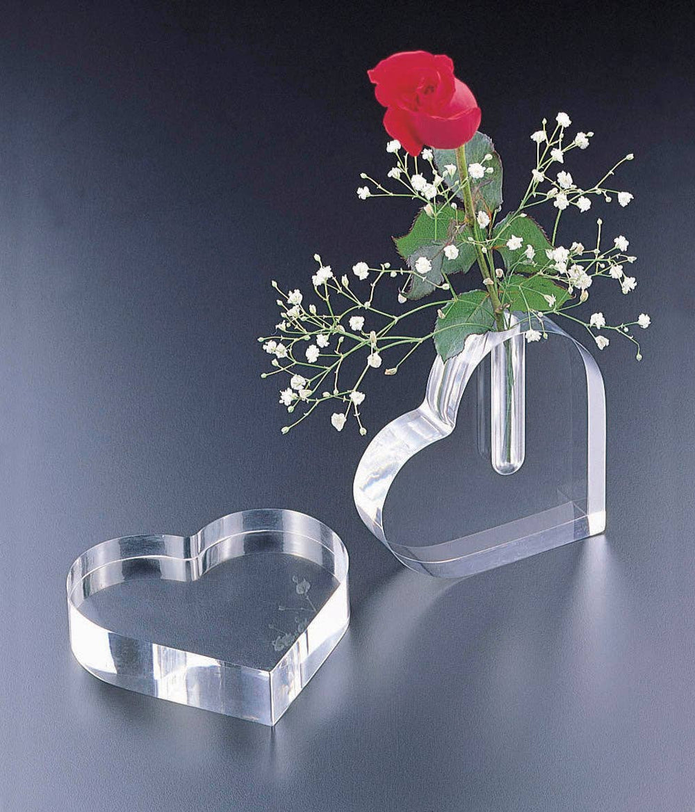 Matching heart-shaped paperweight and bud vase displayed as a coordinated gift set.