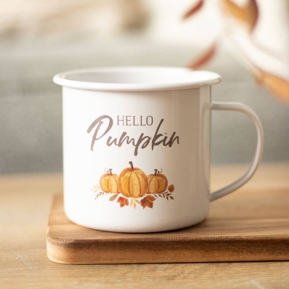 Close up of Hello Pumpkin enamel mug. 