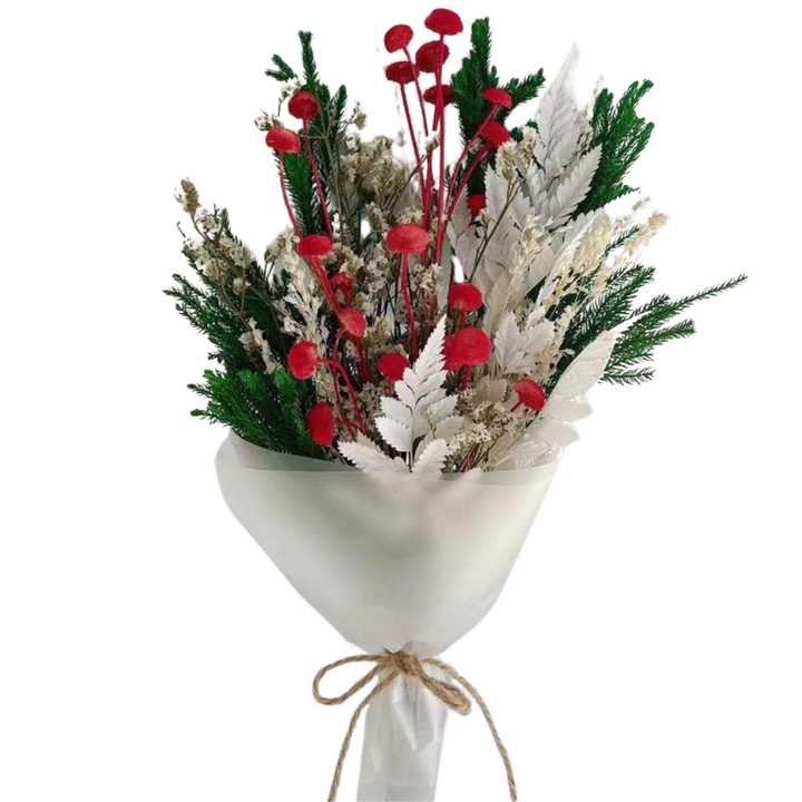 Close-up of red and white Holly Flower Bouquet with natural greenery.