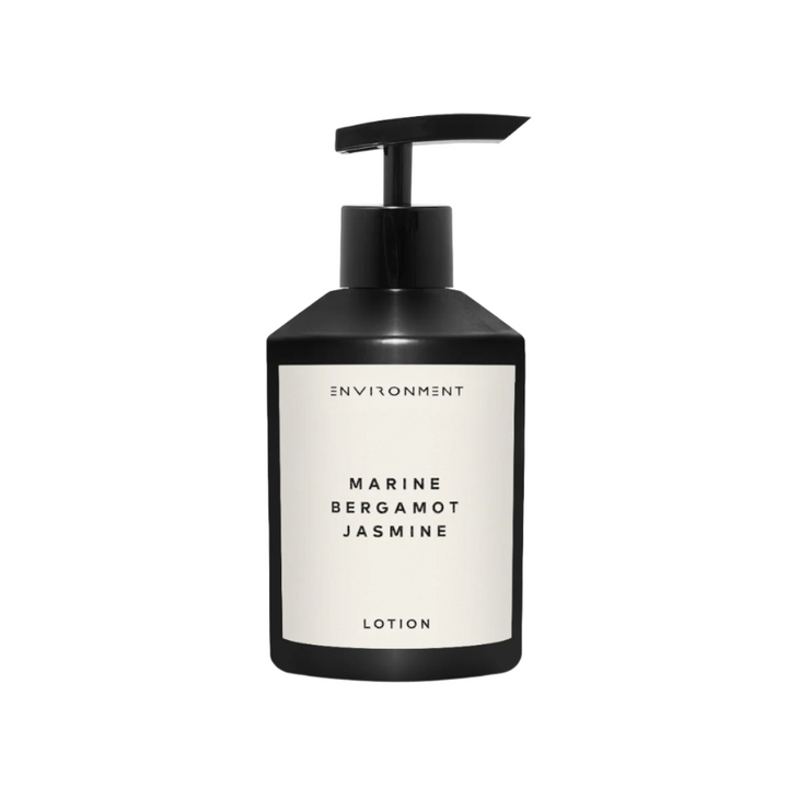 Luxury hand lotion with marine mist, jasmine, and amber scent in modern bottle