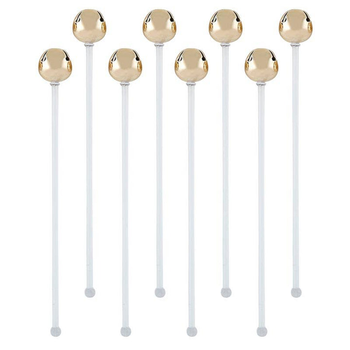 Close-up of Jingle Bell Stir Sticks with gold metal bells at the end.