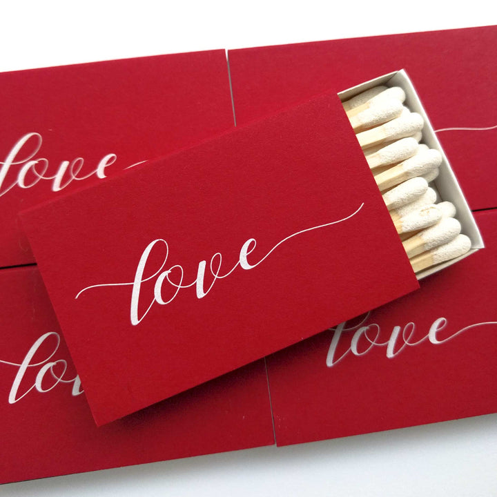 A stylish stack of Love Matches boxes, perfect for gifting or display.