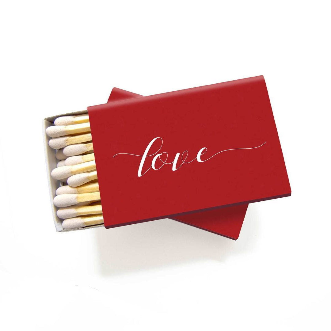 Love Matches in ruby red with matte white foil “love” lettering.