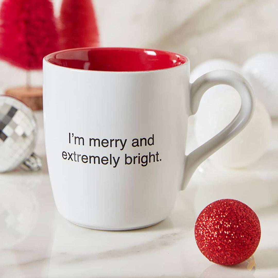 Christmas coffee mug "I'm merry and extremely bright" with charitable proceeds for Ovarian Cancer support.