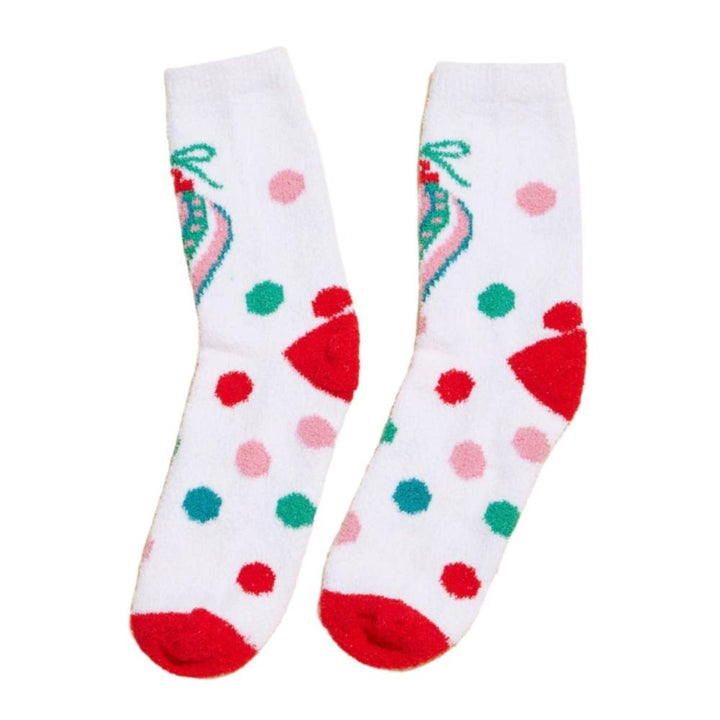 Side view of ornament socks with polka dots and red bow decorations.