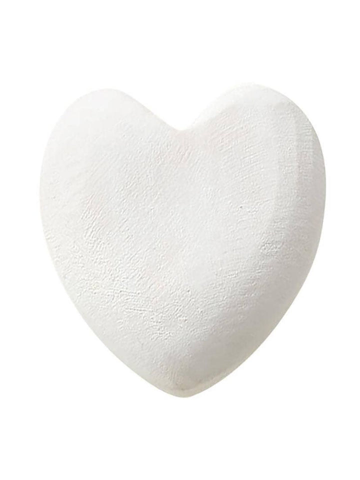 White wooden heart made from Paulownia wood.