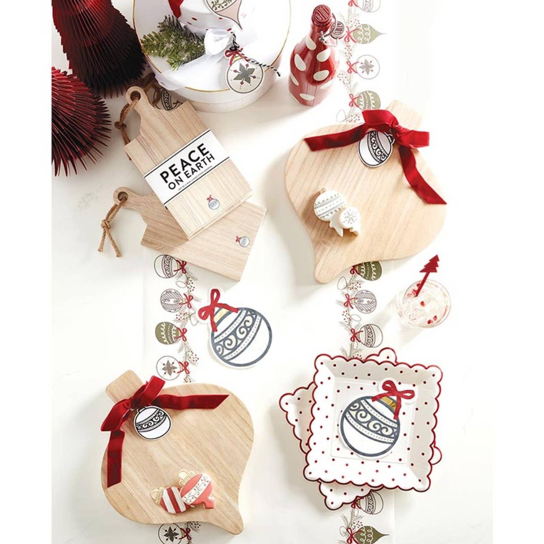 Paulownia Ornament Wood Boards displayed in a festive table setting.