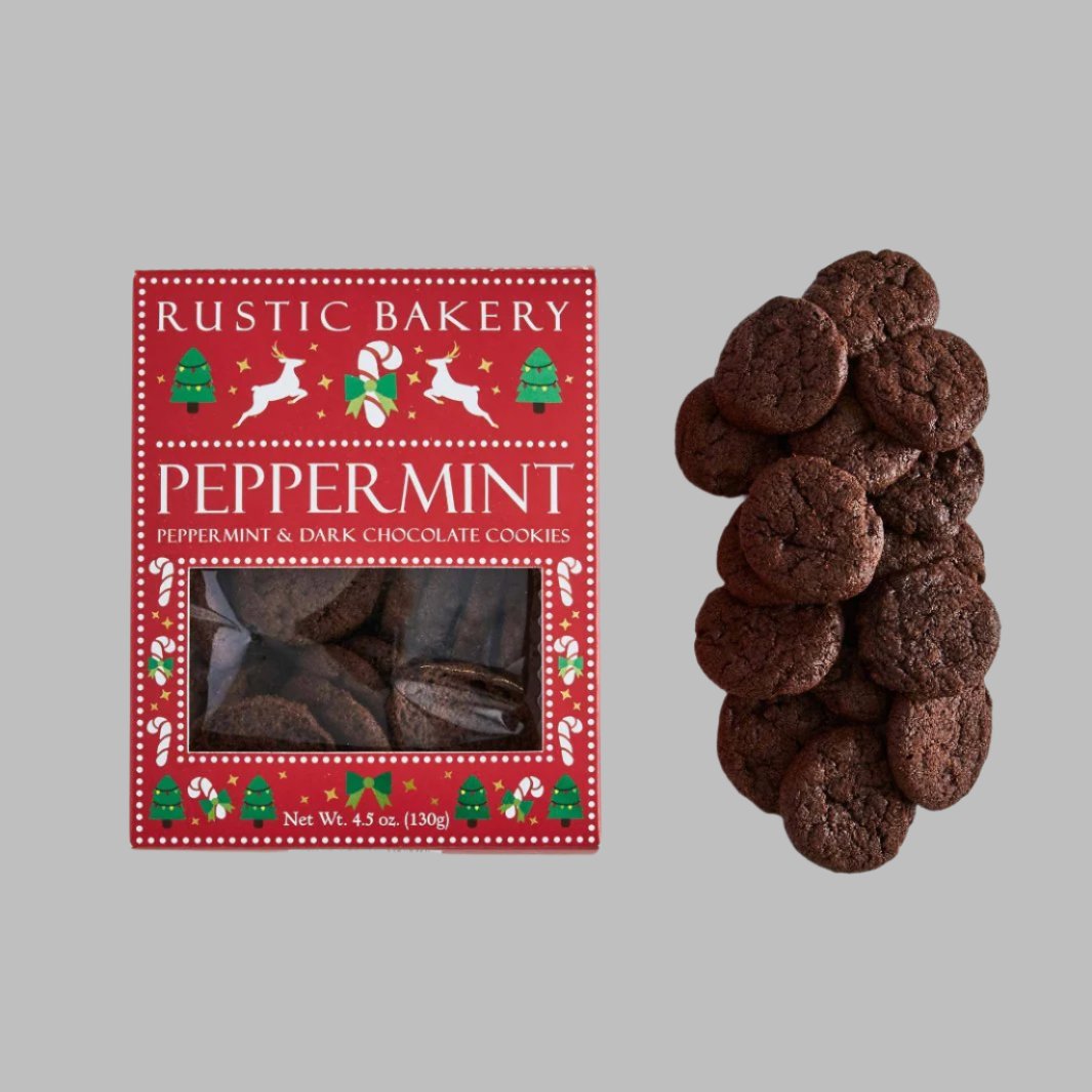 Peppermint Christmas Cookies coated in dark chocolate in a decorative red box.