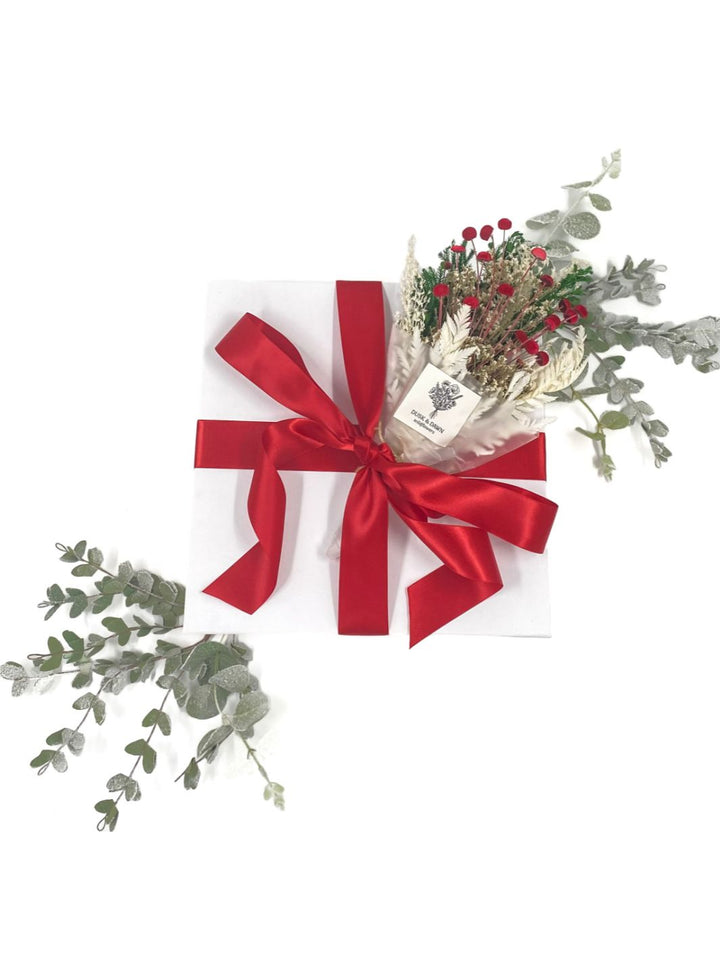 Peppermint Twist Gift Box ready to ship with red stain ribbon and Holly Dried Floral Bouquet. 