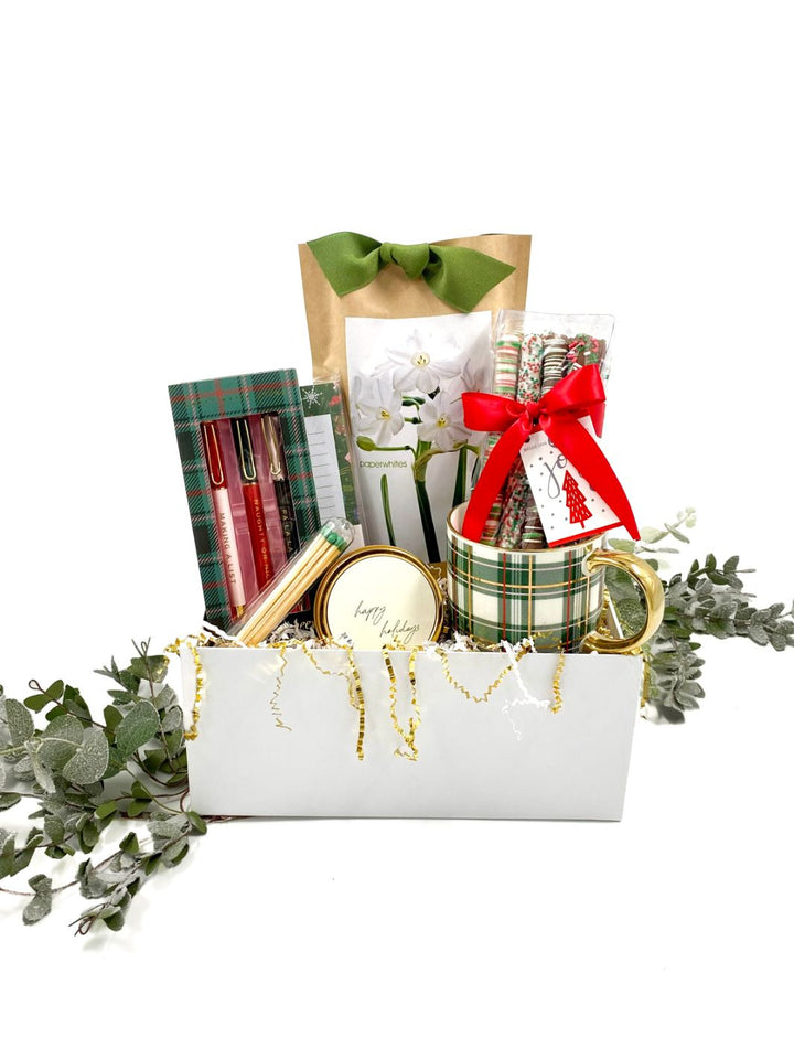 Plaid Tidings Gift Box featuring festive items like a plaid mug, paperwhites kit, and holiday treats in a beautiful green plaid theme.