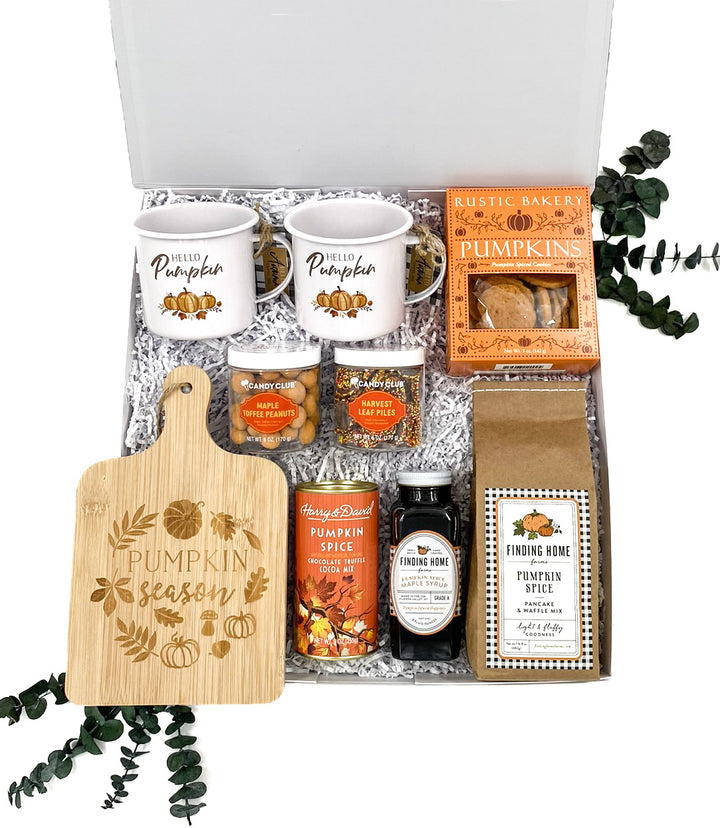 Pumpkin Spice & Everything Nice Gift Box, featuring fall-themed treats like pumpkin spice pancake mix, maple syrup, cocoa, and cozy accessories for autumn gatherings.