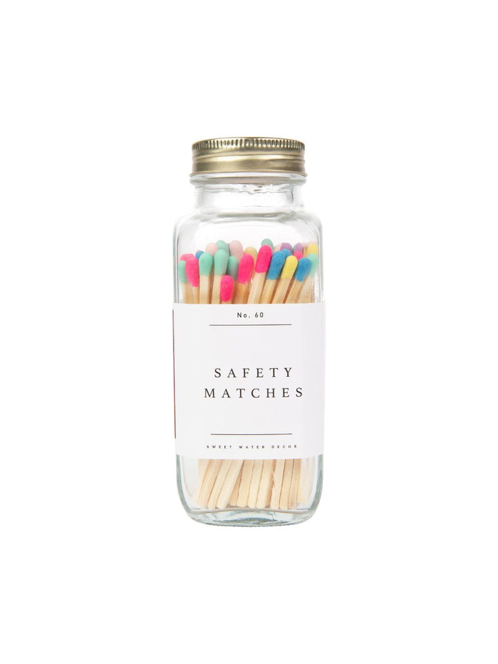 Safety Matches with Multicolor Rainbow Tip: Glass jar containing safety matches with colorful rainbow tips, designed for home decor.