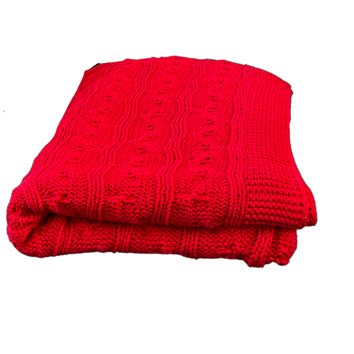 100% cotton cable knit throw blanket in red, ideal for reading and relaxing