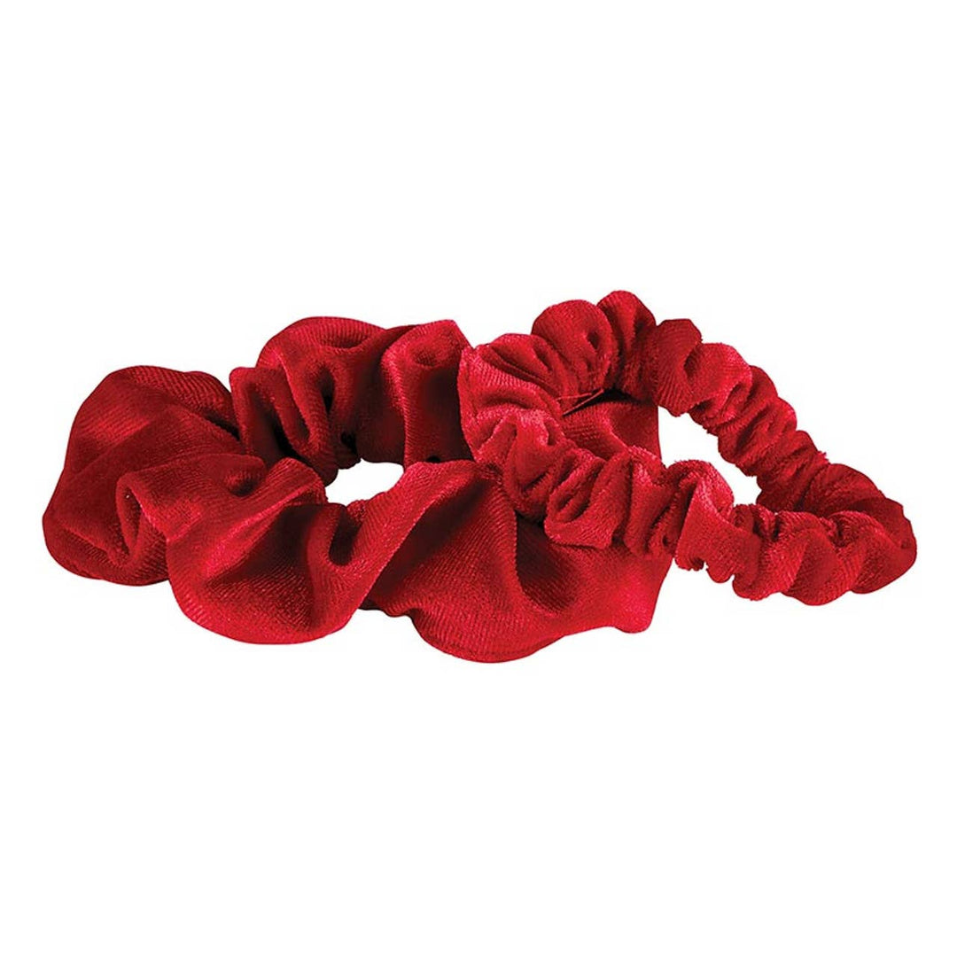 Close-up of two red velvet scrunchies.