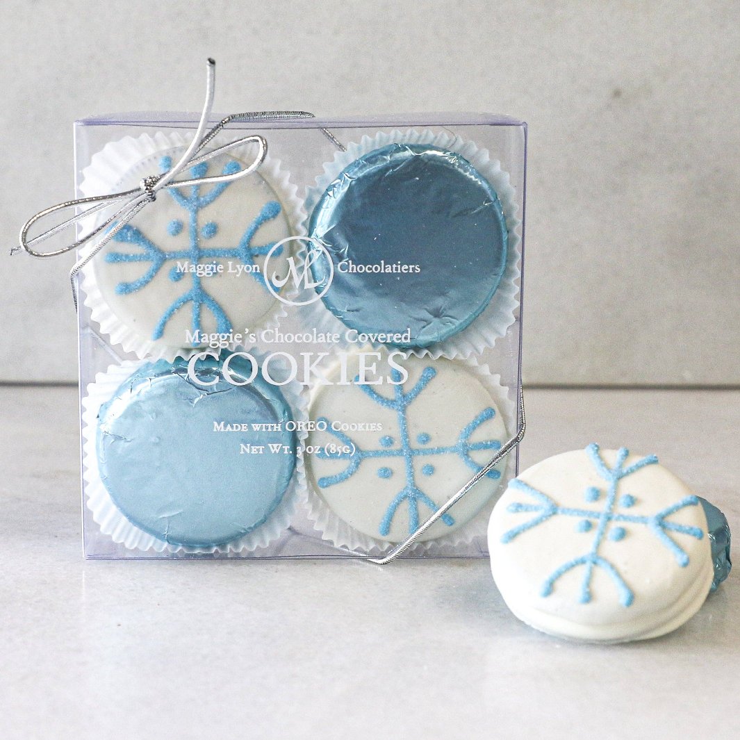 Snowflake Chocolate Covered Cookies by Maggie Lyon, featuring milk and white chocolate with hand-decorated snowflake designs.