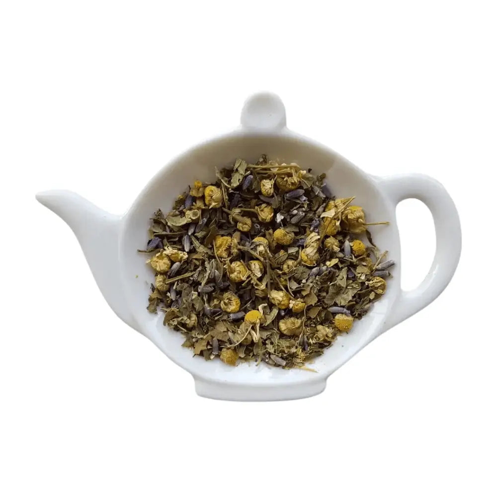 Spa Bliss Tea blend showcasing its vibrant chamomile and lavender flowers.