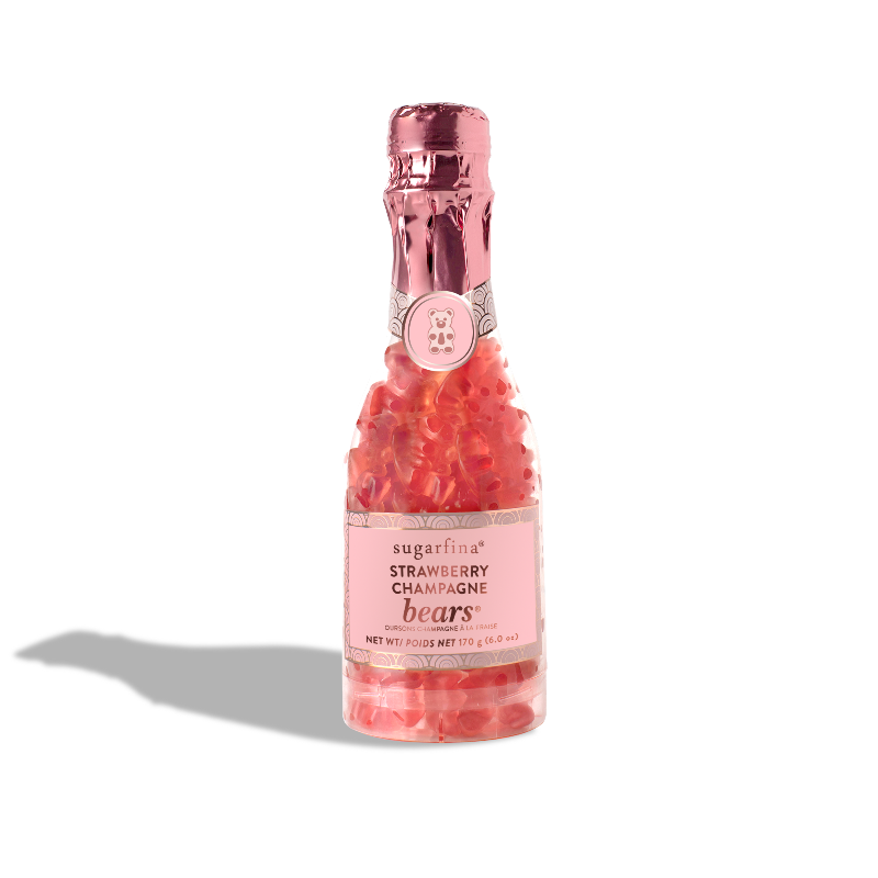 Sugarfina Strawberry Champagne Bears Celebration Bottle with rose gold foil accents.