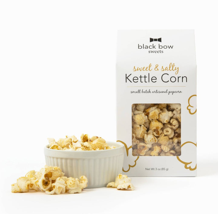 A tent-top box of Sweet & Salty Kettle Corn with a playful popcorn design, perfect for gifting.