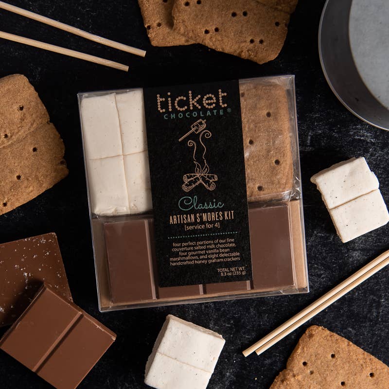 Artisan S’mores Kit with handmade graham crackers, vanilla bean marshmallows, and salted milk chocolate bars for a gourmet camping treat.