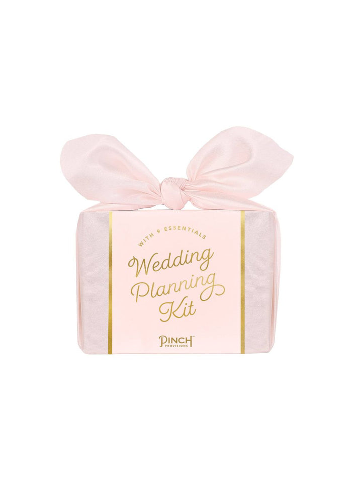 Wedding Planning Kit by Pinch Provisions with eight wedding planning essentials.